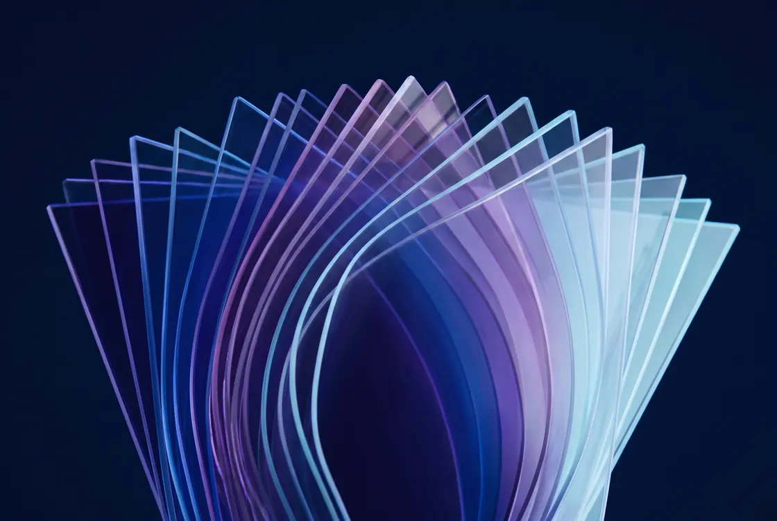 Layered translucent sheets of coloured glass fanned into a gradient